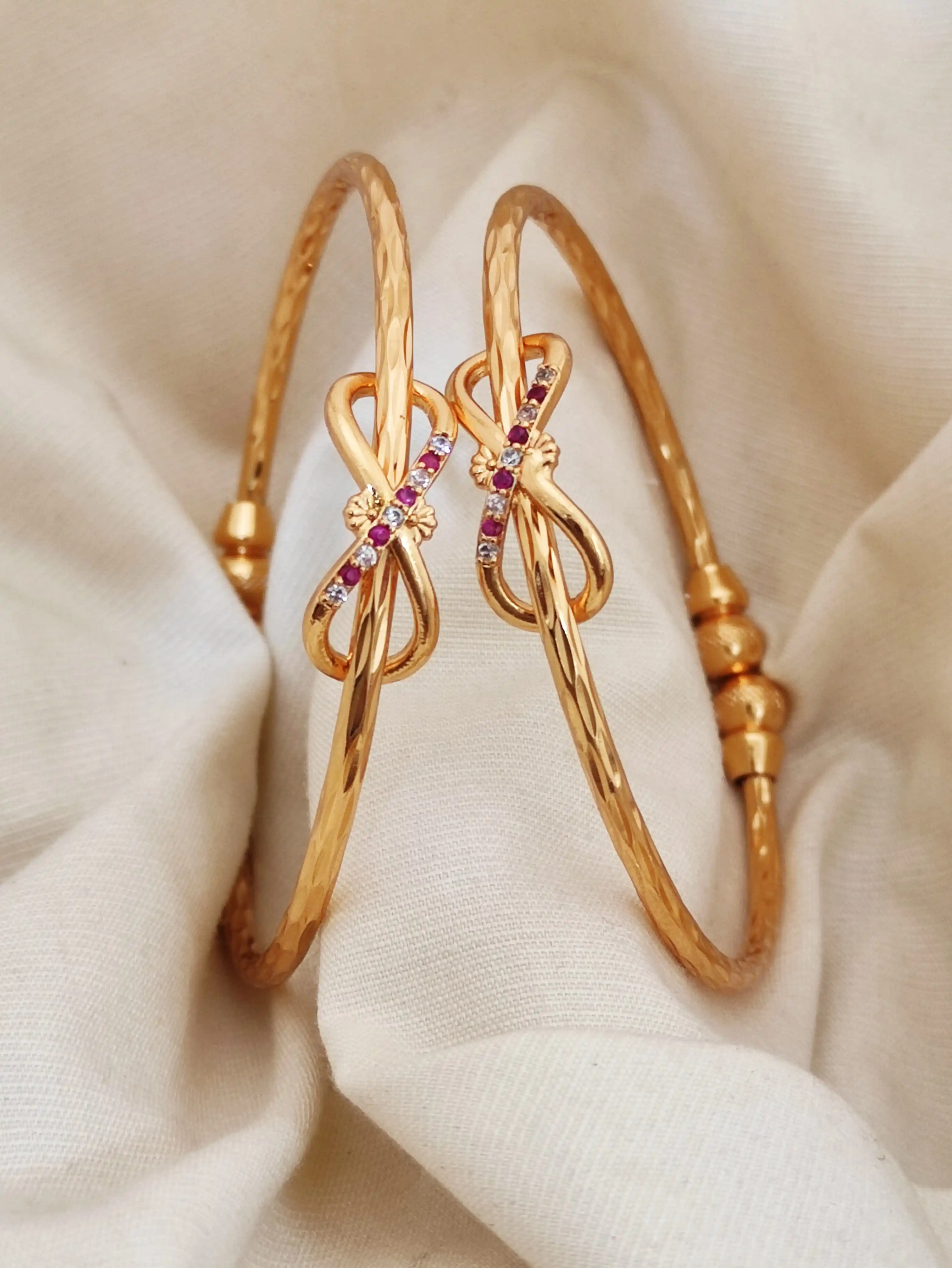 Stylish Infinity Kadli With Stones Pack Of Two Pieces ( 1 pair).png